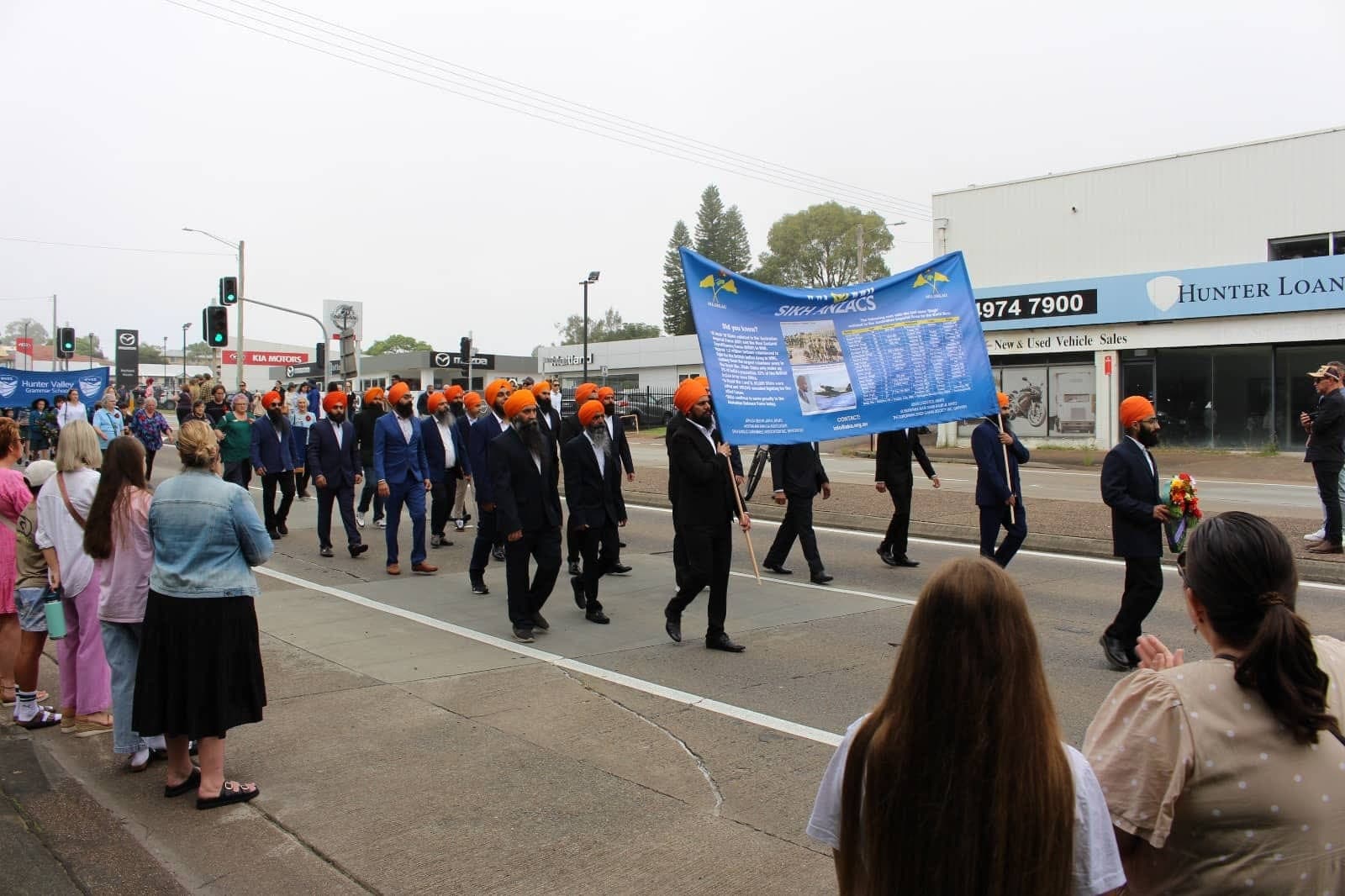 The ANZAC Day march along Queen Street with the Sikh ANZACs banner