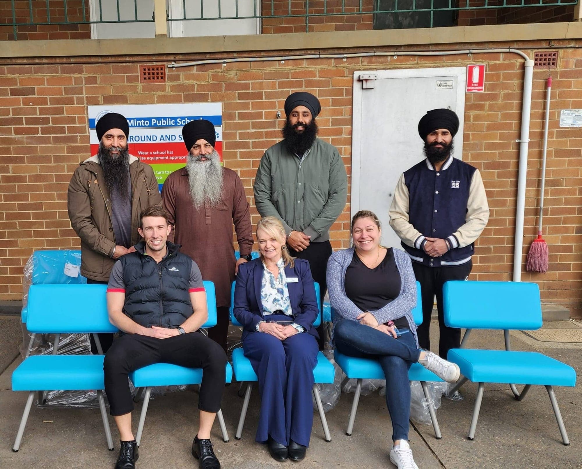 AKA members with teachers at Minto Public School