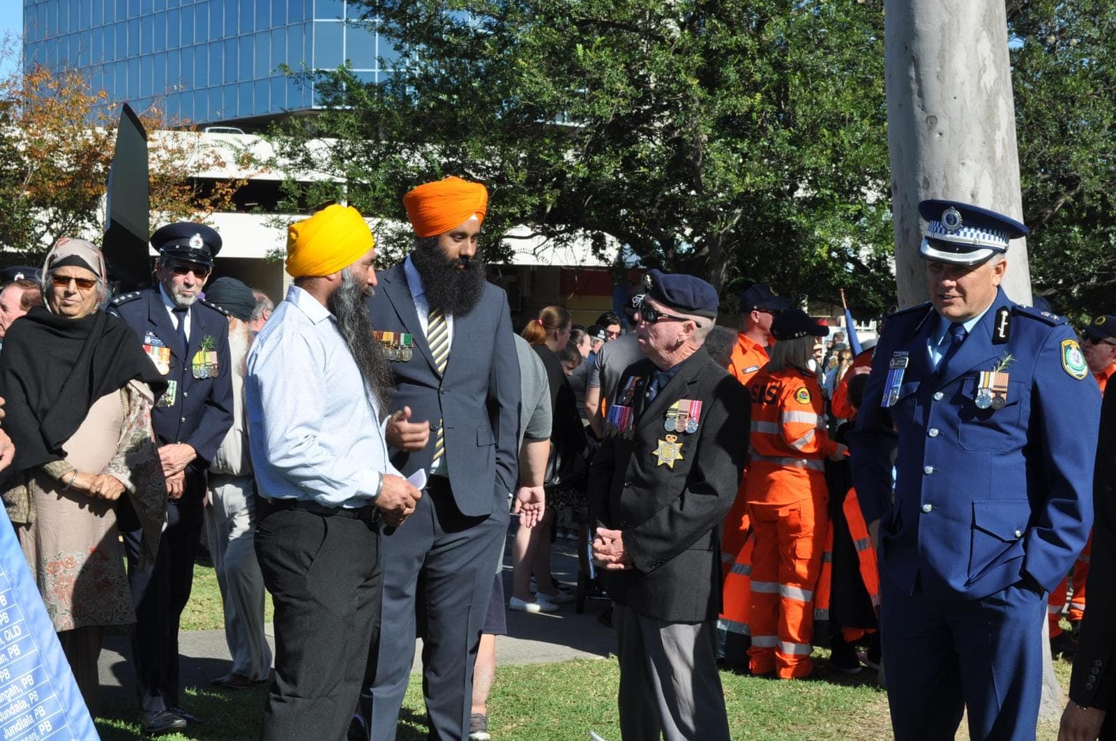 AKA members among veterans and emergency service volunteers at a service