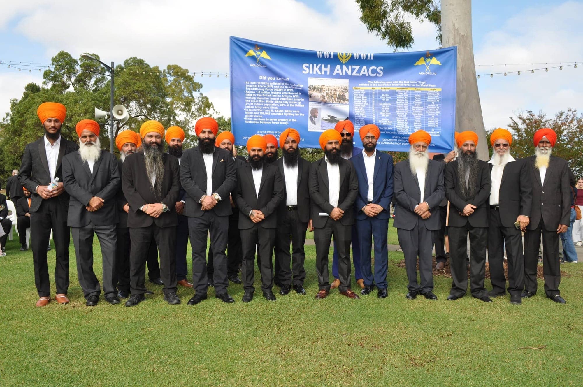 AKA members holding the Sikh ANZACs banner in a park
